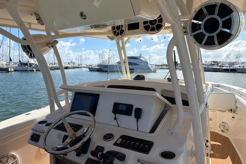  Yacht Photos Pics 2018 Grady-White Canyon 336 boat dashboard with marina view in background.