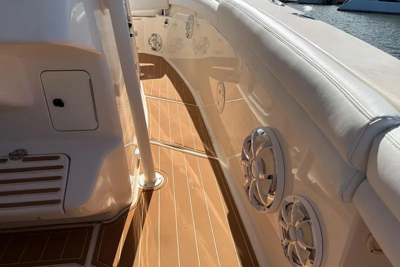  Yacht Photos Pics 2018 Grady-White Canyon 336 boat interior with teak flooring and speaker system.