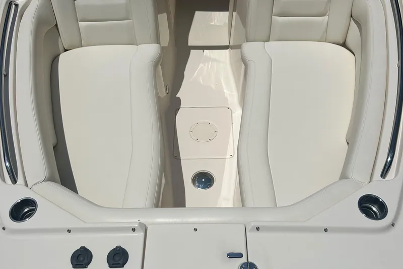 Daddy's Broke Lll Yacht Photos Pics 2020 Grady-White Canyon 306 boat interior with white cushioned seating.