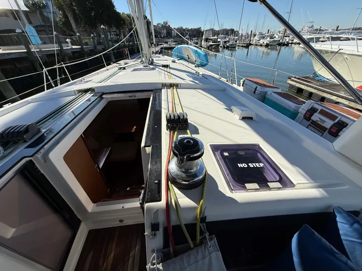 Overkill Yacht Photos Pics Beneteau Oceanis 48 sailboat, deck view in harbor, year 2016.