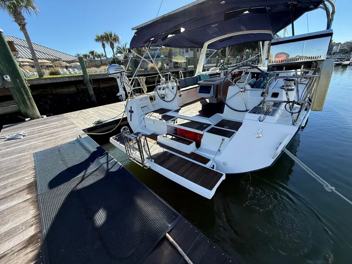Overkill Yacht Photos Pics 2016 Beneteau Oceanis 48 at dock, sunny day.