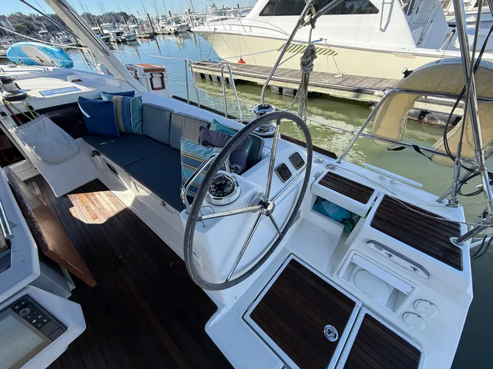 Overkill Yacht Photos Pics Cockpit of 2016 Beneteau Oceanis 48 yacht in marina.