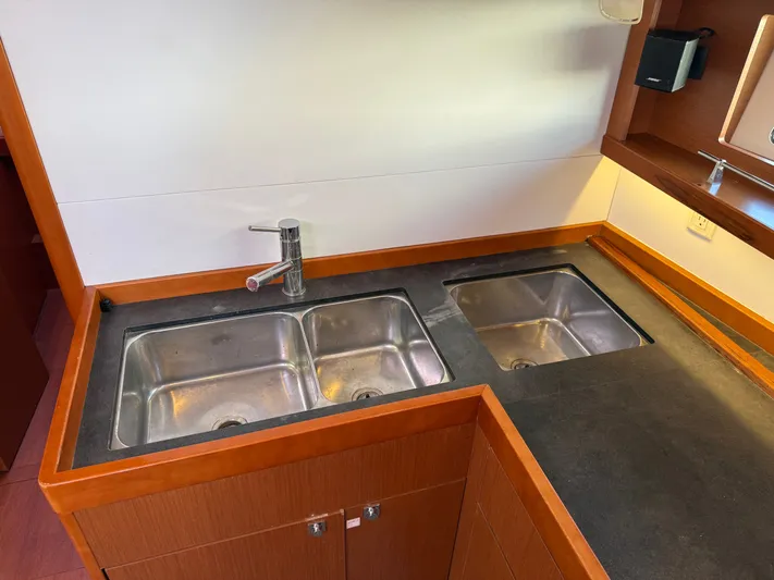 Overkill Yacht Photos Pics Double sink in Beneteau Oceanis 48 yacht kitchen, year 2016.