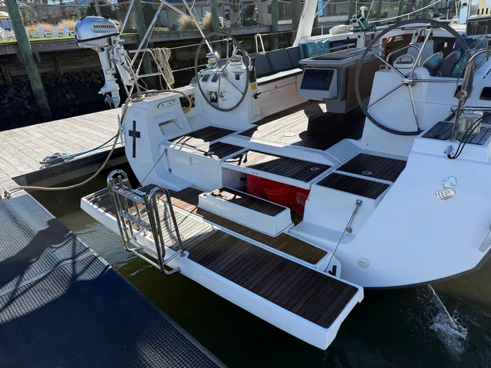 Overkill Yacht Photos Pics Stern view of 2016 Beneteau Oceanis 48 yacht at dock.