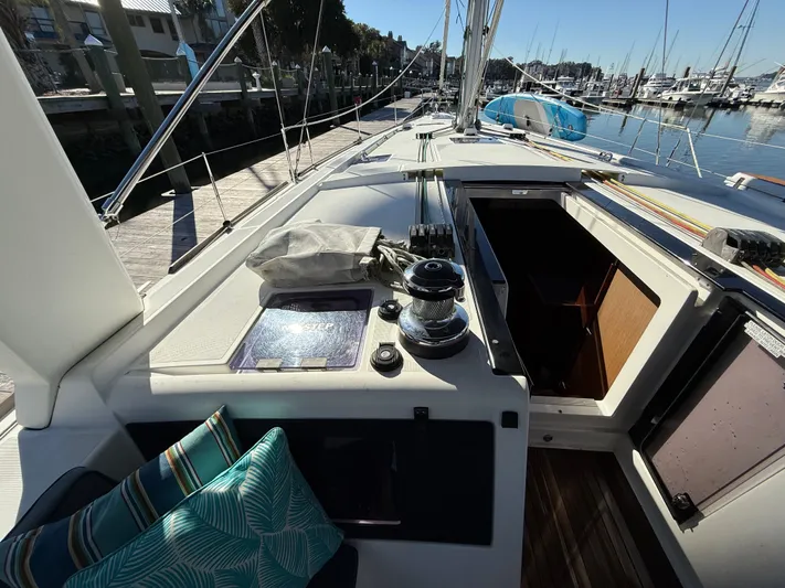 Overkill Yacht Photos Pics Beneteau Oceanis 48 sailboat cockpit, 2016 model, docked at marina.