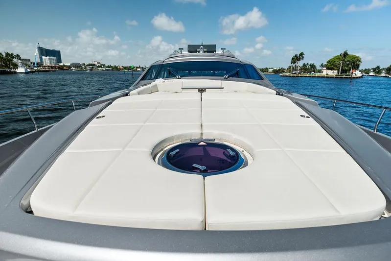 Phoenix Rising Yacht Photos Pics Luxurious 2017 Pershing 82 yacht with spacious sunbathing deck on a sunny day.