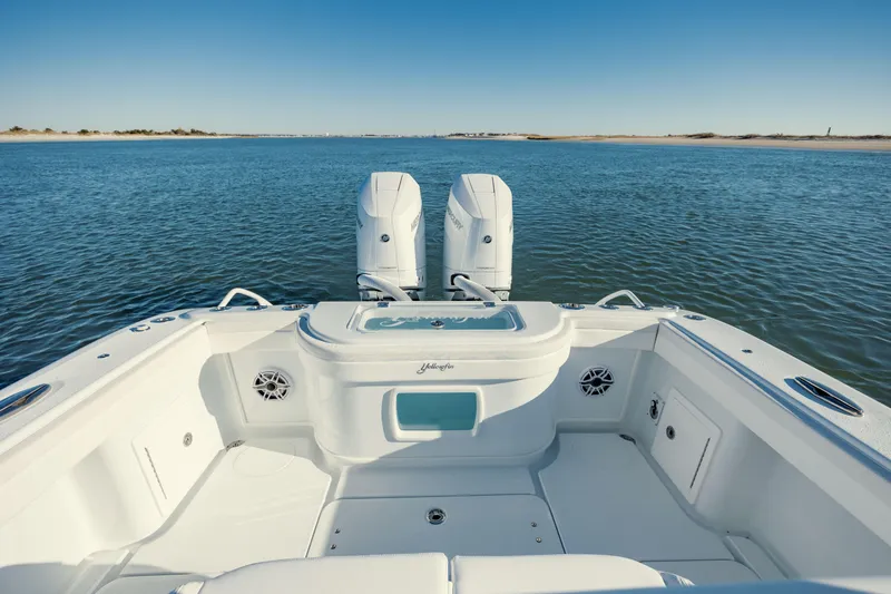  Yacht Photos Pics 2025 Yellowfin 32 boat with dual engines on open water.