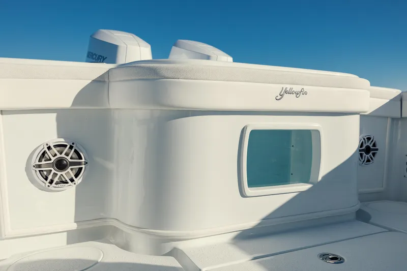  Yacht Photos Pics 2025 Yellowfin 32 boat interior with speakers and storage compartment.