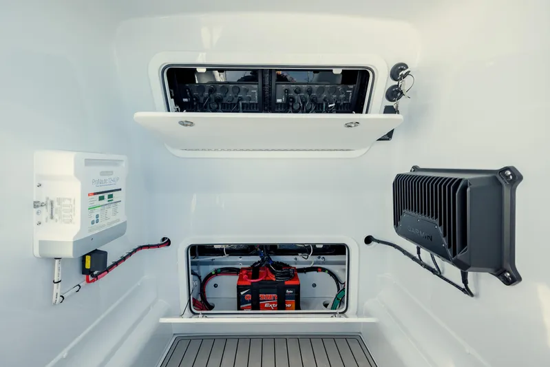  Yacht Photos Pics 2025 Yellowfin 32 boat electrical compartment with battery and control systems.