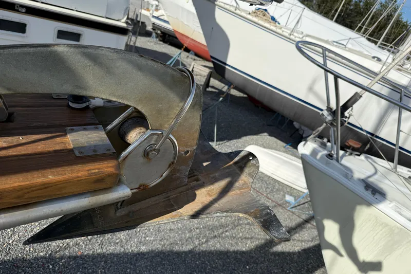 Via Yacht Photos Pics Close-up of a 2004 Caliber 40LRC sailboat anchor and bow detail.