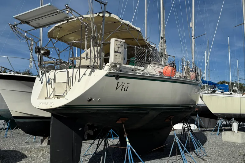 Via Yacht Photos Pics 2004 Caliber 40LRC sailboat on stands, Seattle, WA, with solar panels and safety equipment.
