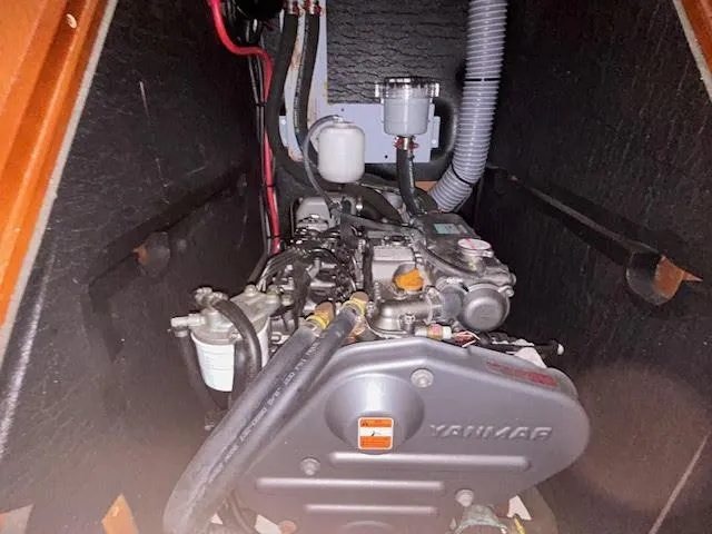  Yacht Photos Pics Engine compartment of a 2016 Beneteau Oceanis 45 sailboat, featuring a Yanmar engine.