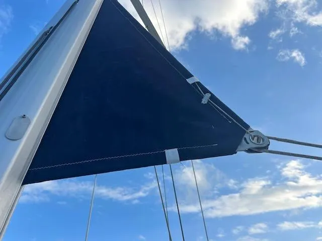  Yacht Photos Pics Sail of 2016 Beneteau Oceanis 45 against blue sky.
