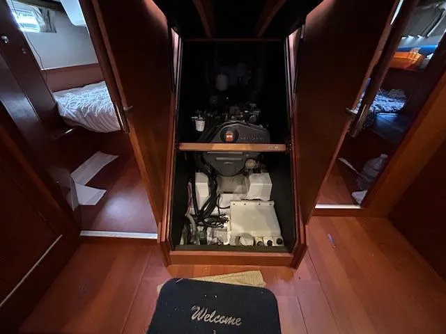  Yacht Photos Pics Engine room of 2016 Beneteau Oceanis 45 sailboat, featuring a compact engine setup.