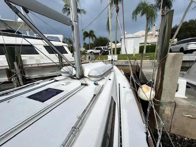  Yacht Photos Pics 2016 Beneteau Oceanis 45 sailboat docked, featuring sleek deck design and modern rigging.