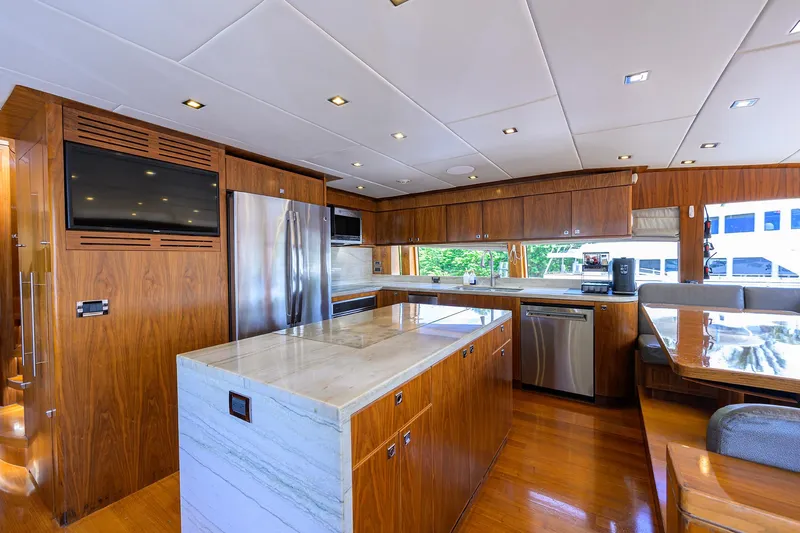 Second Amendment Yacht Photos Pics Luxurious kitchen interior of 2018 Hargrave 100 Raised Pilothouse yacht with modern appliances.