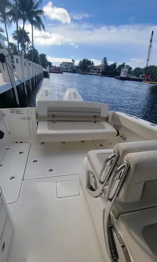  Yacht Photos Pics 2021 Boston Whaler 320 Vantage boat interior with waterfront view.