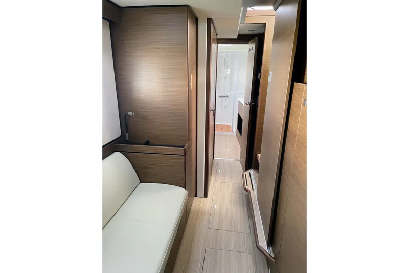  Yacht Photos Pics Interior of 2022 Nautitech 44 Open yacht, featuring sleek wood paneling and modern design.