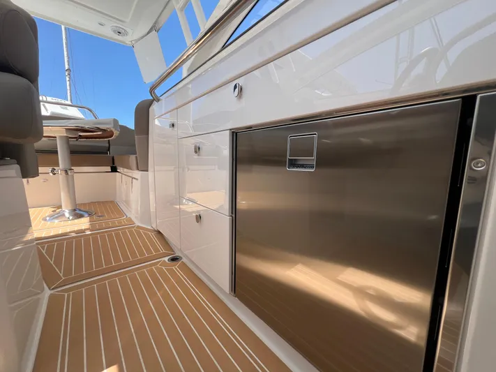 Mdr #297 In Stock Yacht Photos Pics 2024 Nimbus W9 boat interior with sleek cabinetry and modern design.