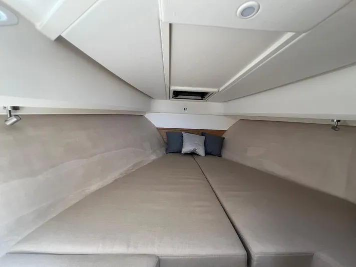 Mdr #297 In Stock Yacht Photos Pics Luxurious interior cabin of 2024 Nimbus W9 boat with comfortable bedding.