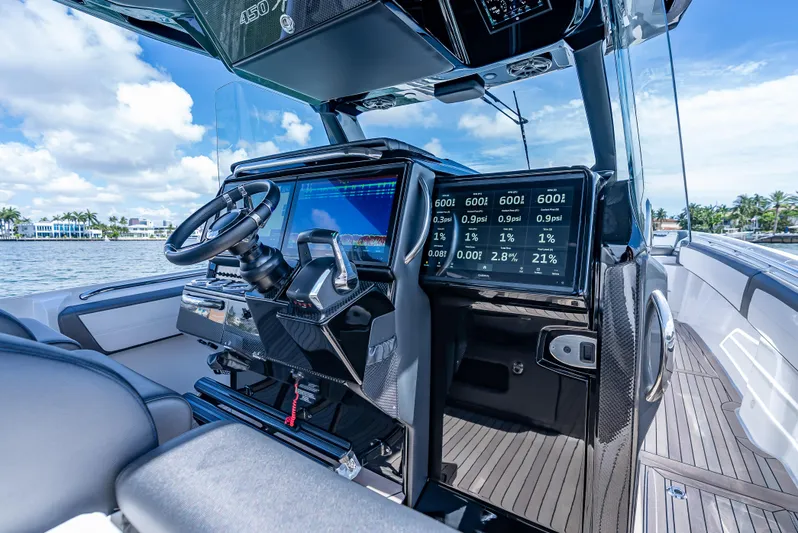 Yacht Photos Pics Interior of 2022 Nor-Tech 450 Sport boat with advanced navigation and control systems.