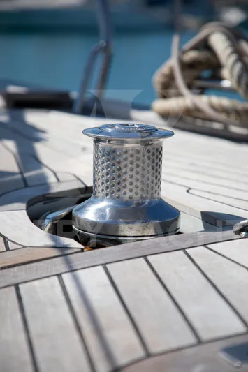 Satori Yacht Photos Pics Close-up of a Farr 64 yacht deck winch, 2005 model, with coiled ropes.