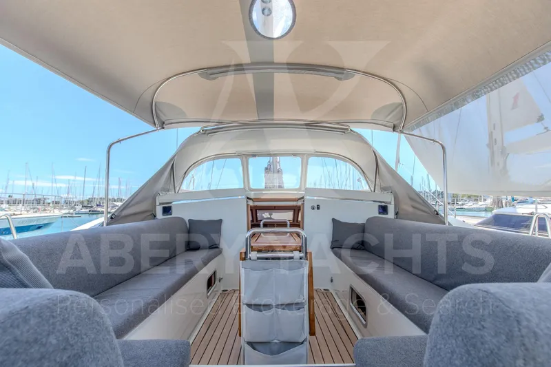 Satori Yacht Photos Pics Luxurious 2005 Farr 64 yacht interior with spacious seating and elegant design.