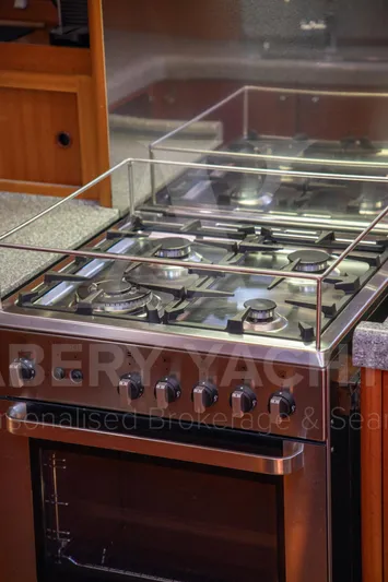 Satori Yacht Photos Pics Stainless steel stove and oven in a Farr 64 yacht kitchen, 2005 model.