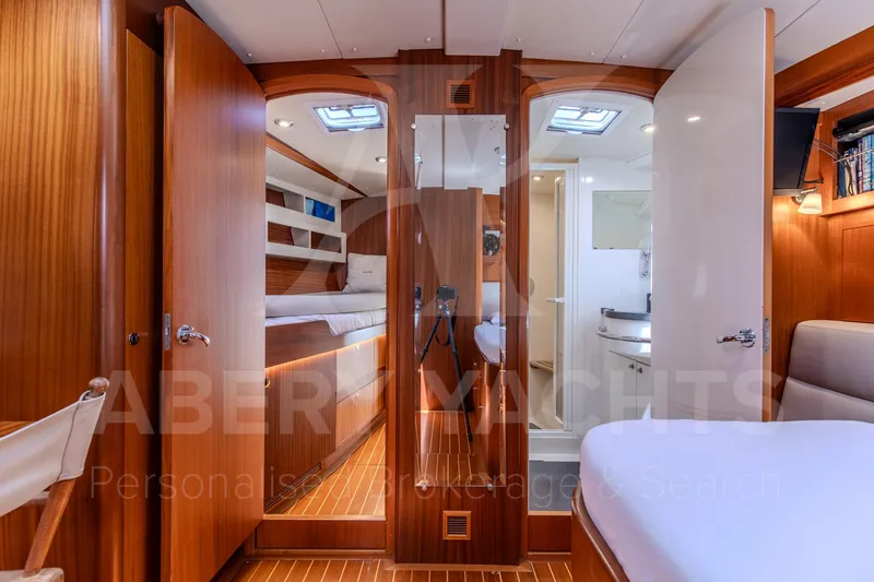 Satori Yacht Photos Pics Luxurious Farr 64 yacht interior, featuring wood finishes and modern amenities, 2005 model.