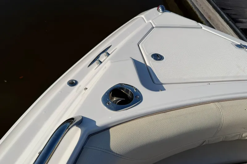 Yacht Photos Pics 2019 Regal 33 SAV boat bow with white seating and stainless steel fixtures.