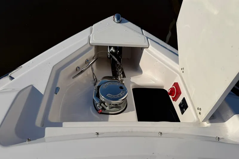  Yacht Photos Pics 2019 Regal 33 SAV boat anchor compartment with winch and control panel.