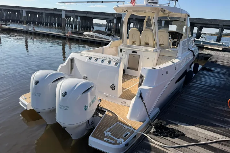  Yacht Photos Pics 2019 Regal 33 SAV boat docked with twin Yamaha engines.