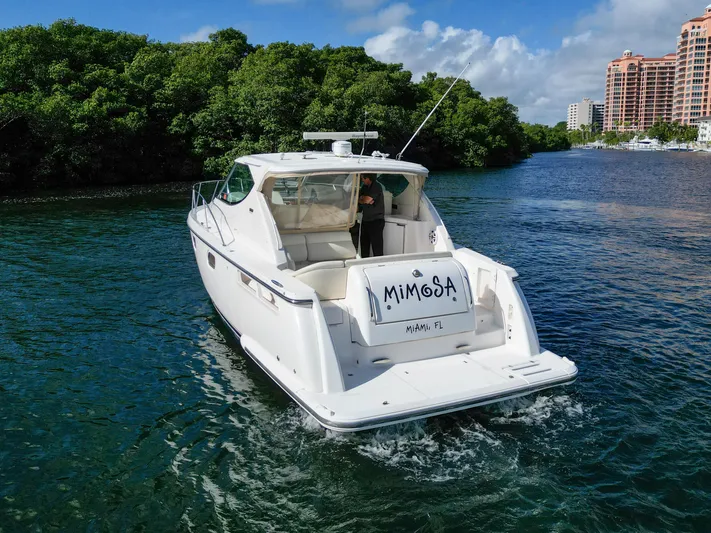  Yacht Photos Pics 2008 Tiara Yachts 3900 Sovran cruising on a scenic waterway.