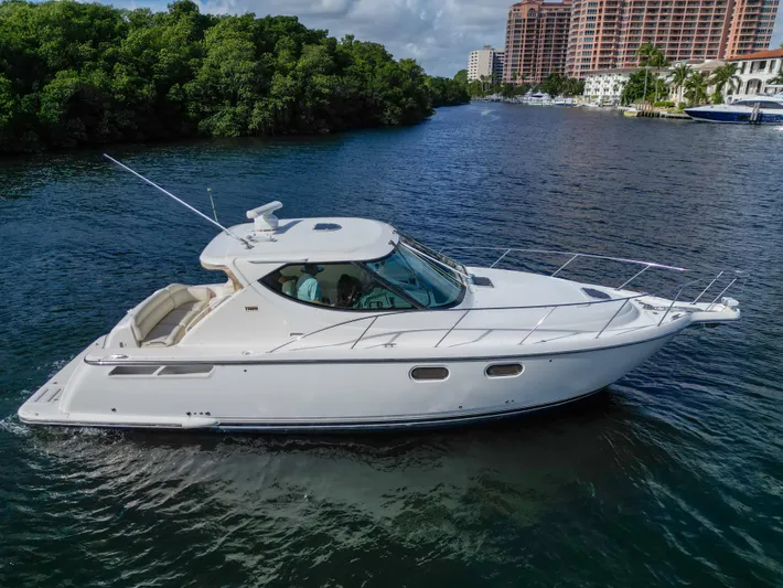  Yacht Photos Pics 2008 Tiara Yachts 3900 Sovran cruising on a scenic waterway.