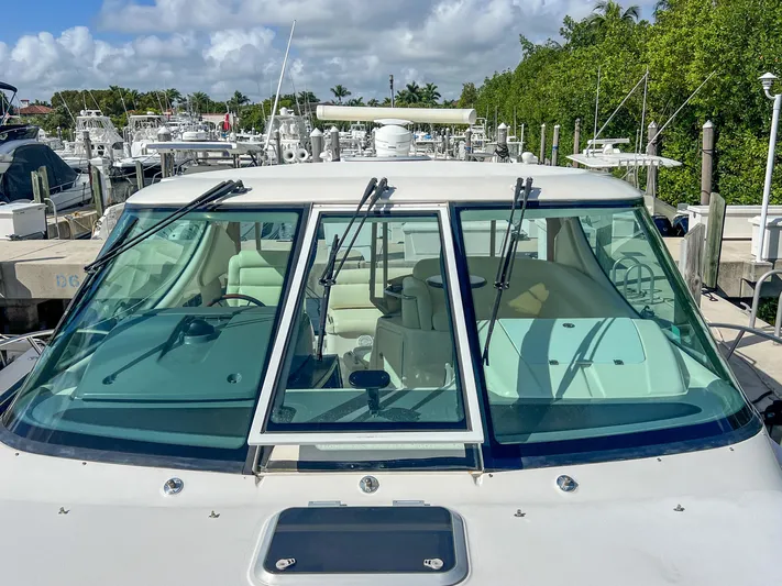  Yacht Photos Pics 2008 Tiara Yachts 3900 Sovran docked, showcasing sleek design and spacious interior.