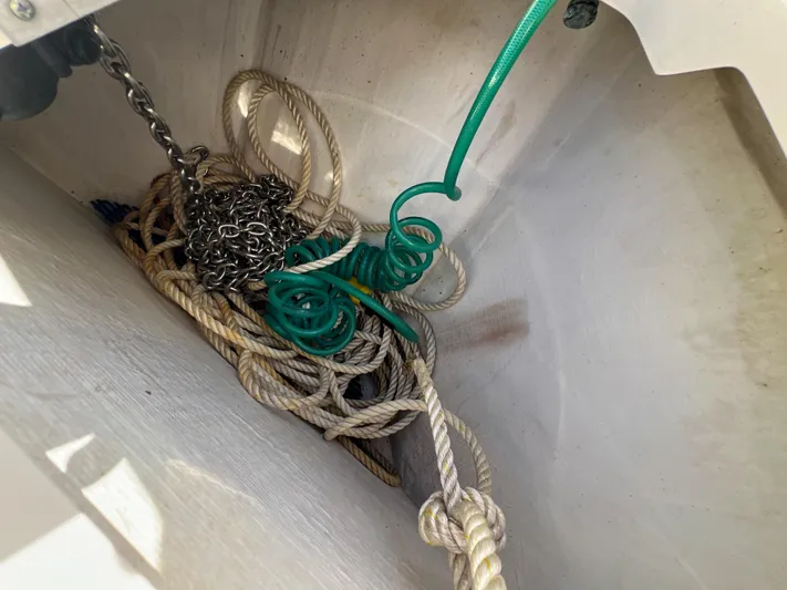  Yacht Photos Pics Anchor locker with ropes and chains on a 2008 Tiara Yachts 3900 Sovran.
