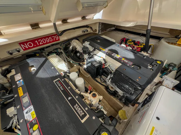  Yacht Photos Pics Engine compartment of 2008 Tiara Yachts 3900 Sovran, showcasing dual engines and mechanical components.