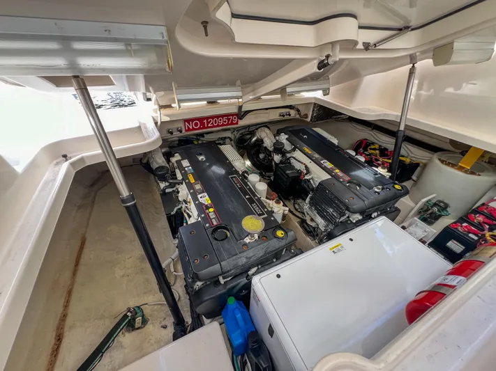  Yacht Photos Pics Engine room of 2008 Tiara Yachts 3900 Sovran, showcasing dual engines and equipment.