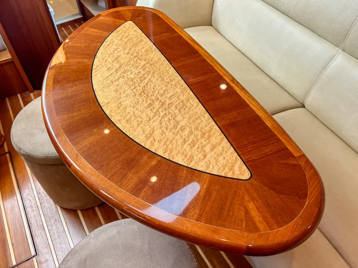  Yacht Photos Pics Luxurious wooden table in 2008 Tiara Yachts 3900 Sovran interior.