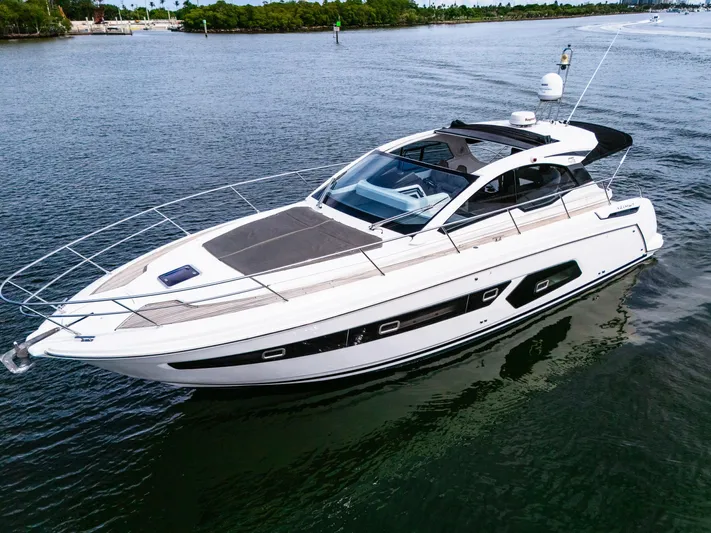 Amici Yacht Photos Pics 2019 Azimut Atlantis 43 yacht cruising on calm waters.