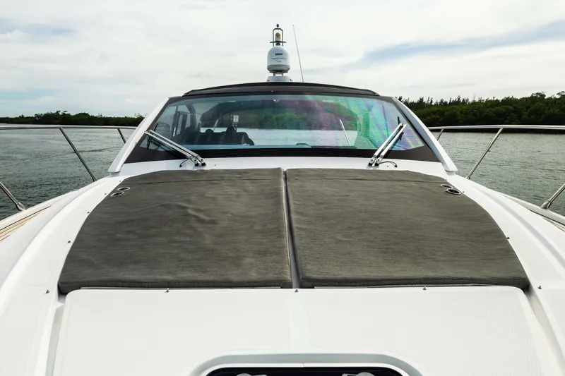 Amici Yacht Photos Pics 2019 Azimut Atlantis 43 yacht with sleek deck design on calm waters.