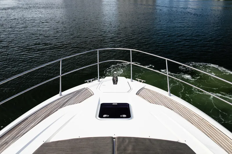 Amici Yacht Photos Pics Bow view of 2019 Azimut Atlantis 43 yacht cruising on calm waters.