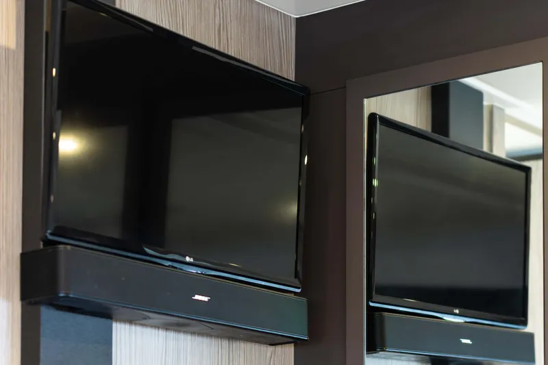 Amici Yacht Photos Pics Flat-screen TV with soundbar in 2019 Azimut Atlantis 43 yacht interior.