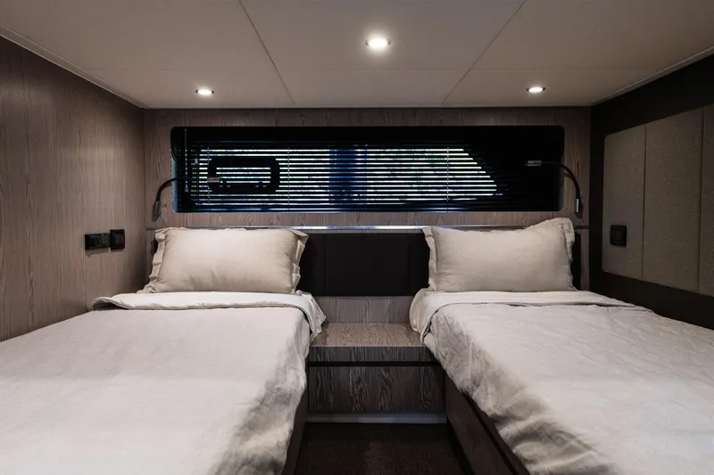 Amici Yacht Photos Pics Interior of 2019 Azimut Atlantis 43 yacht with twin beds and modern lighting.