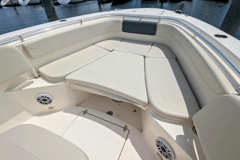  Yacht Photos Pics 2023 Cobia 280 Center Console boat with spacious seating and modern design.