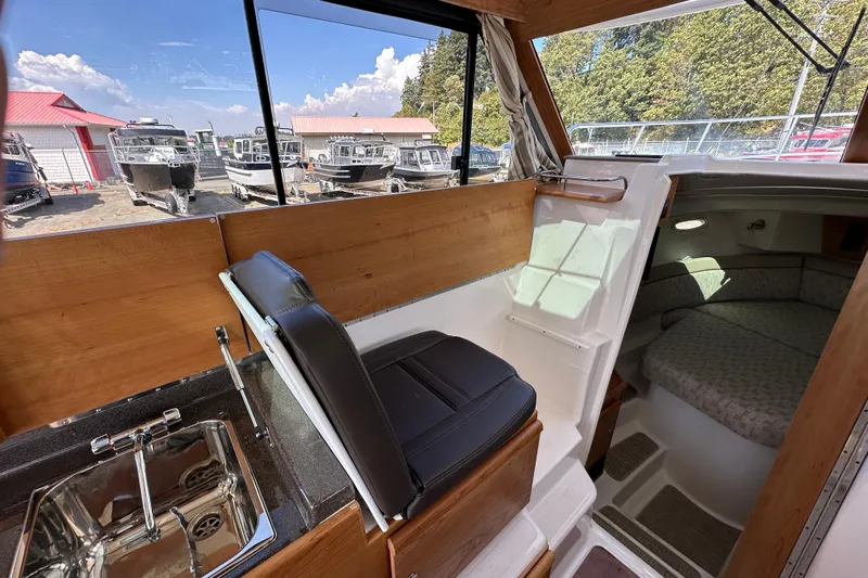  Yacht Photos Pics Interior of 2026 Cutwater C-32 C boat with seating and cabin area.