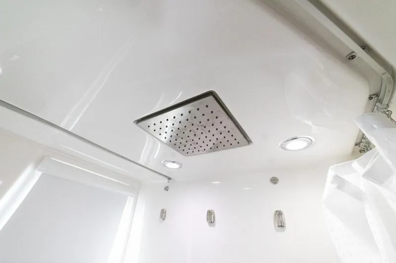  Yacht Photos Pics Manufacturer Provided Image: 2022 Solace 41 CS boat shower ceiling with rain showerhead and LED lights