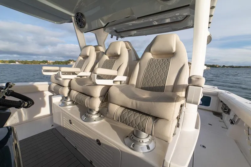  Yacht Photos Pics Manufacturer Provided Image: Luxurious seating on the 2022 Solace 41 CS boat with ocean backdrop.