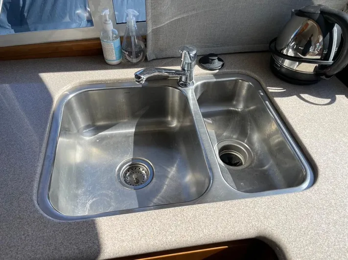 "spirit Island" Yacht Photos Pics Stainless steel double sink in 2004 Navigator 4400 pilot house kitchen.