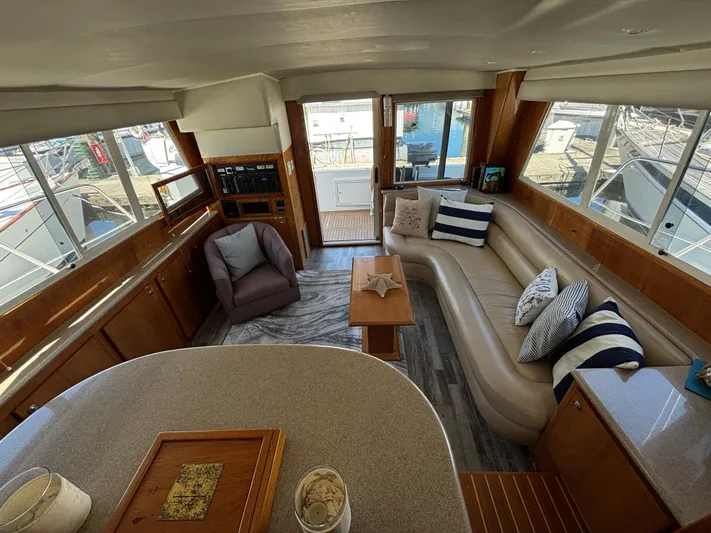 "spirit Island" Yacht Photos Pics Luxurious interior of 2004 Navigator 4400 pilot house with plush seating and nautical decor.